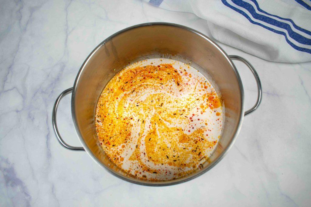 Kokosiniai jollof stiliaus ryžiai. Kokosų pienas